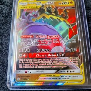 Naganadel & Guzzlord tag team card